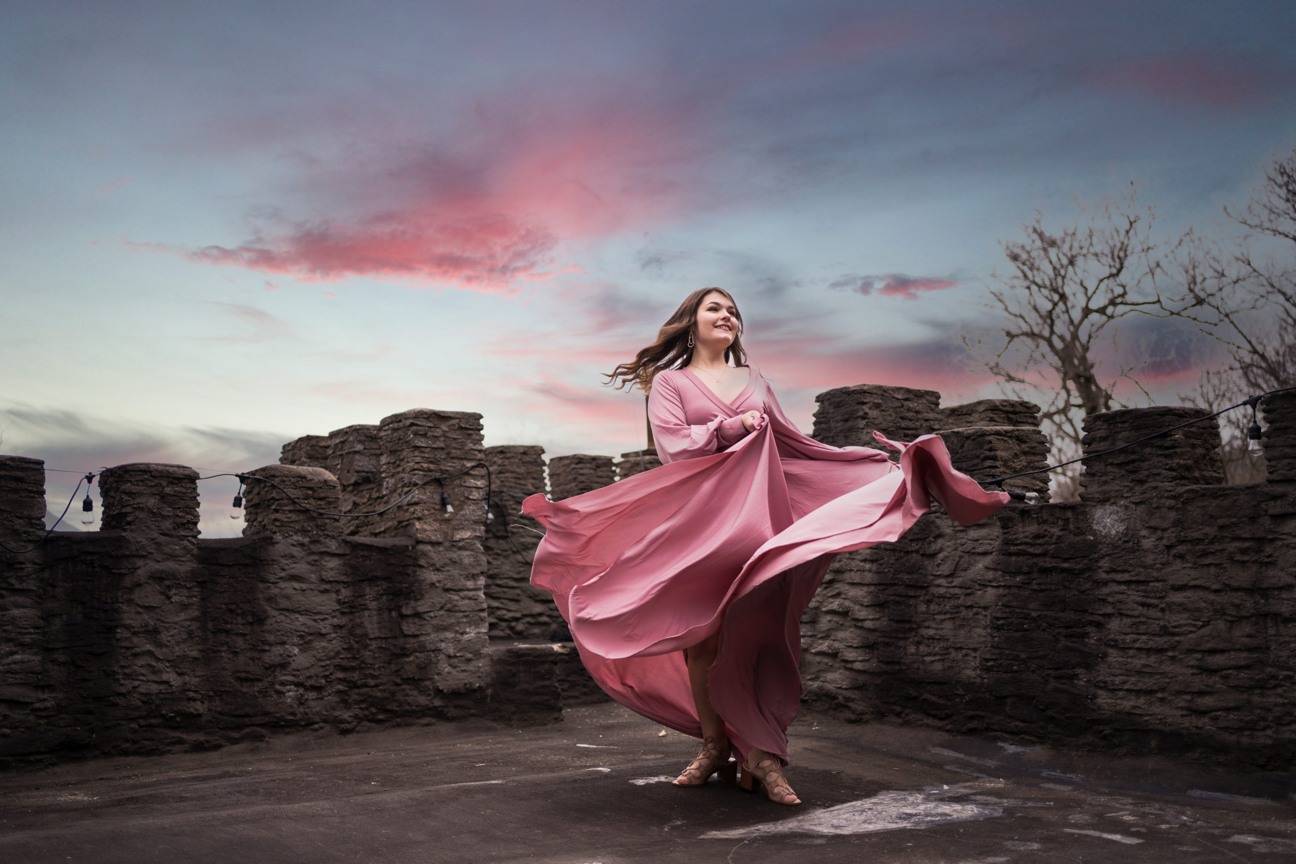 Loveland Castle Senior Session. Flowy dusty rose gown in the gardens. Spinning on top of the castle 
