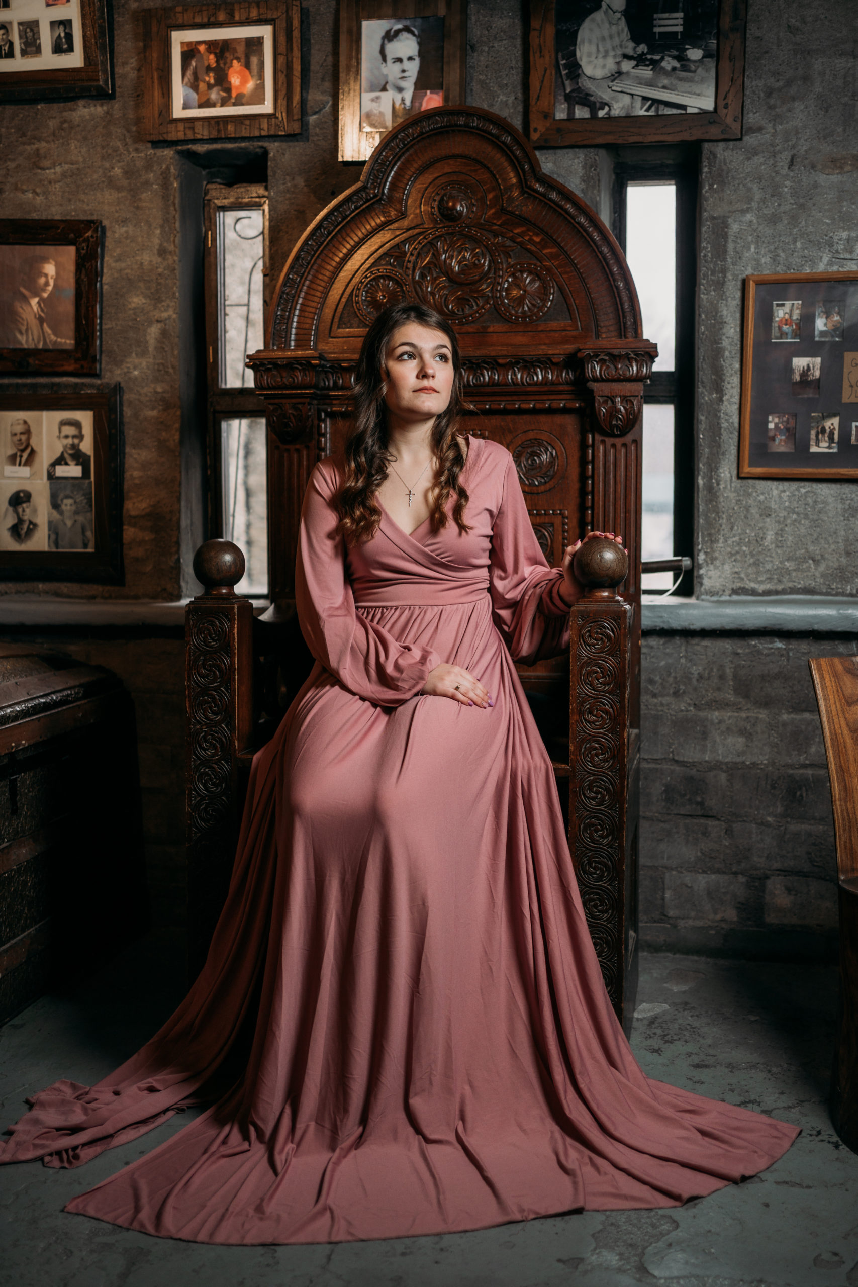 Loveland Castle Senior Session. Flowy dusty rose gown in the gardens. Sitting in royal chair. 